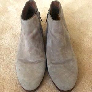 Light beige suede booties w 1-inch heel.